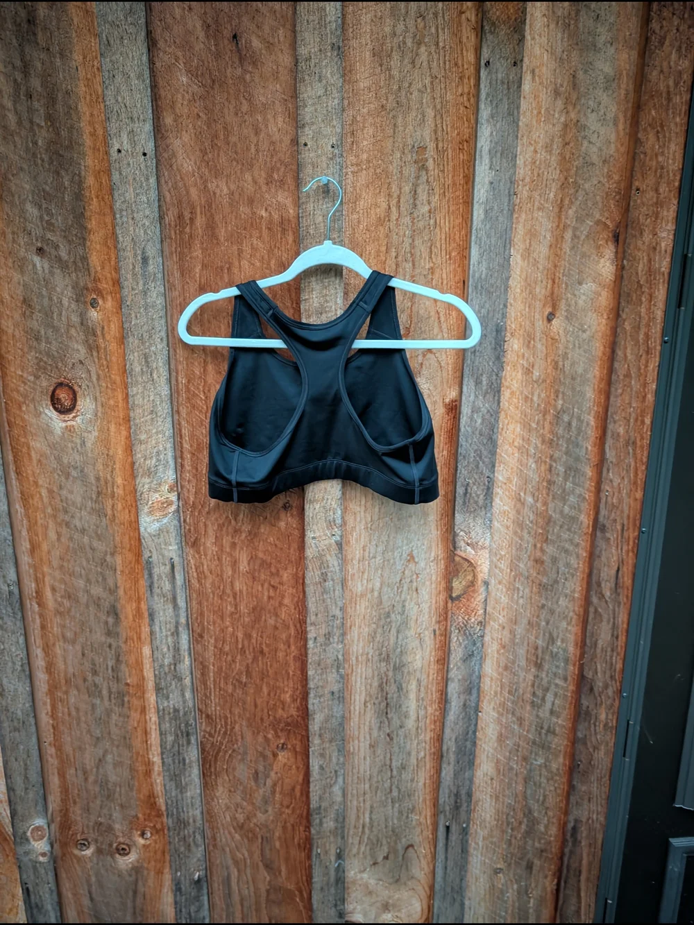 Nike Black Sports Bra with Gold Swoosh Logo